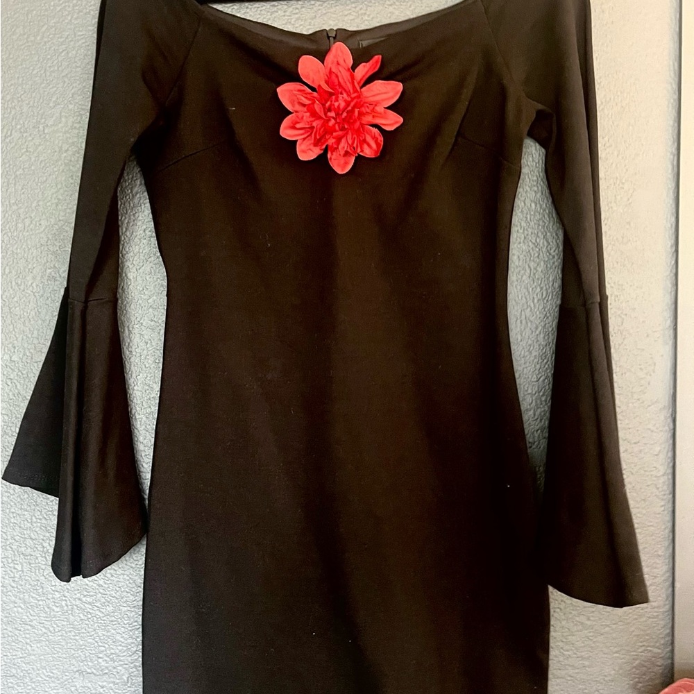 Gorgeous stretch Black dress by LULUS. Size Medium bell sleeves